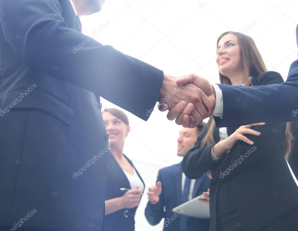 Business handshake. Business handshake and business people conce