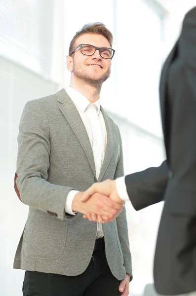 Close up of business handshake in the office — Stock Photo, Image