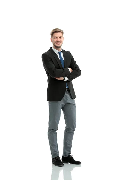 Portrait in full growth - the young smiling businessman Royalty Free Stock Images
