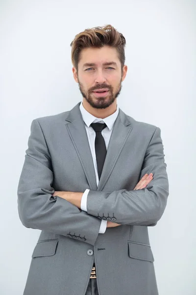 Porträt eines lächelnden gutaussehenden Geschäftsmannes über weißem Hintergrund — Stockfoto