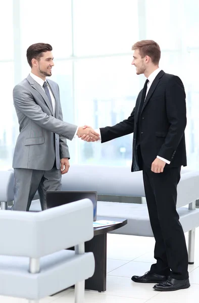 Business people shaking hands during a meeting Royalty Free Stock Photos