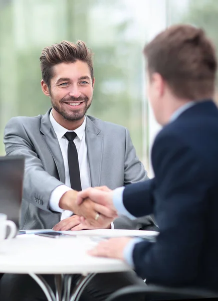 Business handshake. Two business people shaking hands in office. — Stock Photo, Image