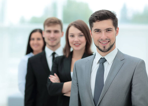 Group of successful business people looking confident