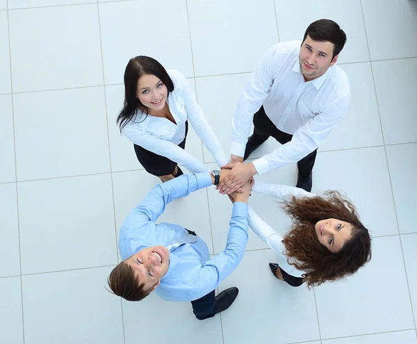Group of business people putting their hands on top of each othe Royalty Free Stock Photos
