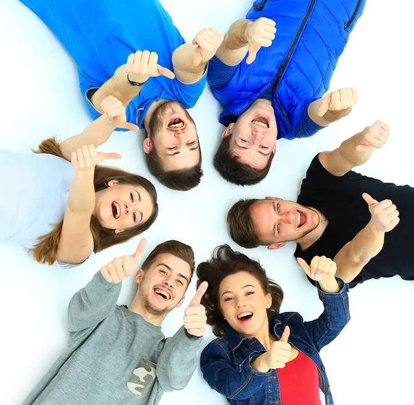 Young people lying down — Stock Photo, Image