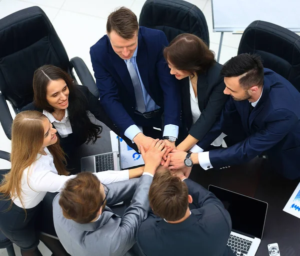 Business people showing unity with their hands together — Stock Photo, Image