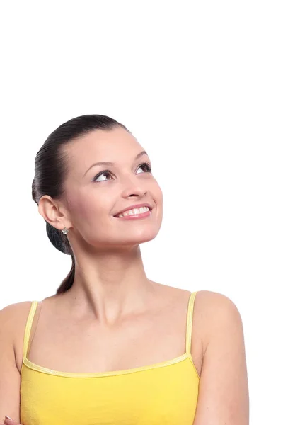 Mujer joven sonriente mirando hacia otro lado aislada en blanco — Foto de Stock