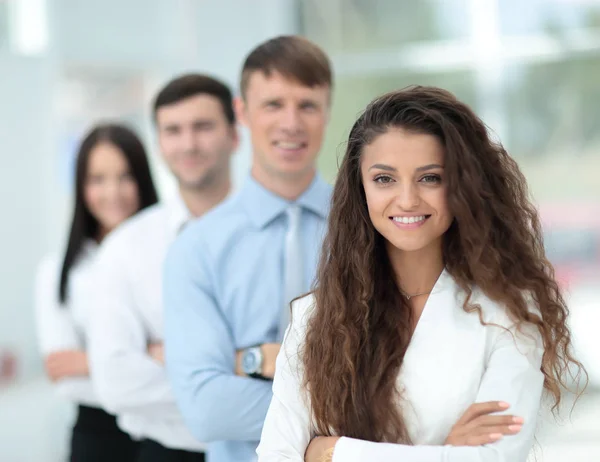 Portrait of businesswoman  looking at camera on the background o — Stock Photo, Image