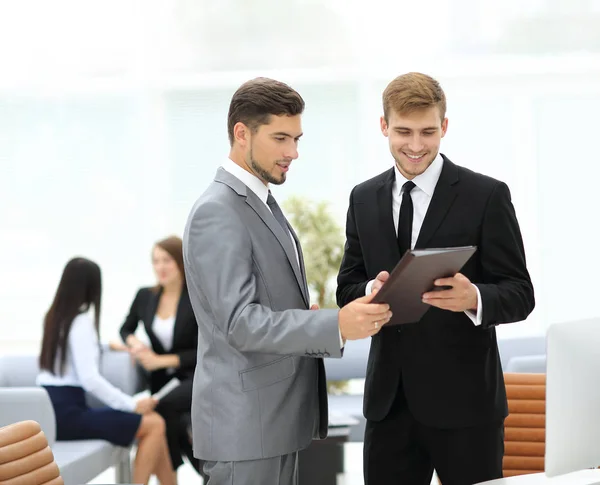 Image of business partners discussing documents and ideas at mee — Stock Photo, Image