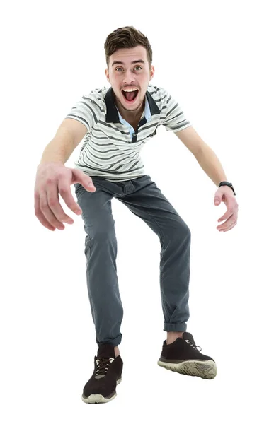 Young man celebrating his success over white background — Stock Photo, Image