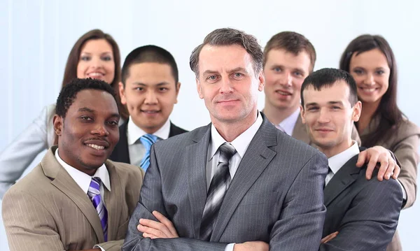 Hombre de negocios y equipo empresarial cohesivo — Foto de Stock