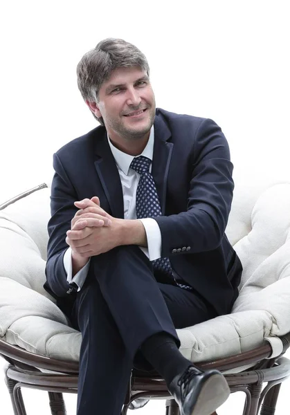 Tired businessman is resting, sitting in a soft chair. — Stock Photo, Image