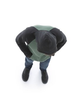 Yukarıdan görüntüleyin. Hipster aşağı bakıyor bir kukuleta ile ceket