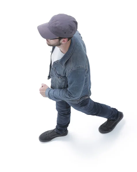 View from above. guy in a baseball cap and denim jacket — Stock Photo, Image