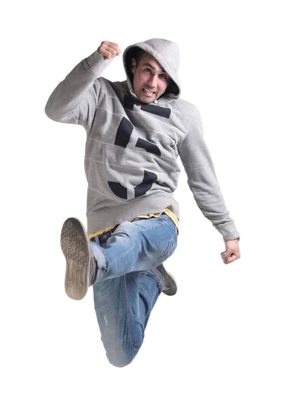 Смешной веселый счастливый человек прыгает в воздухе на белом фоне — стоковое фото