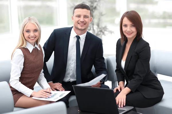 Professional business team working with financial documents. — Stock Photo, Image