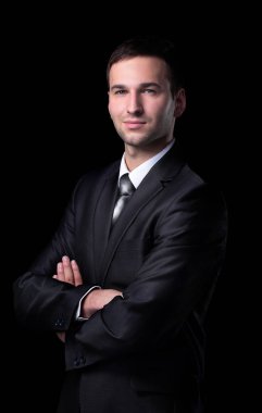 Siyah izole bir olgun gülümseyen iş adamı portresi.