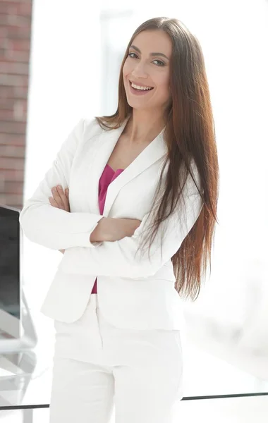 Elegant business woman in a white business suit — Stock Photo, Image