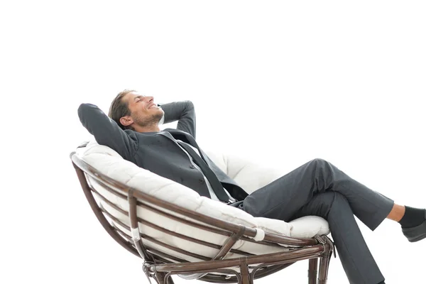 Homem de negócios feliz relaxando em grande poltrona confortável — Fotografia de Stock