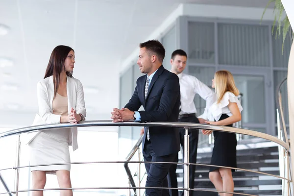 Business people having break and talking on terrace of office building. — Stock Photo, Image