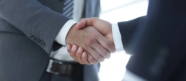 Businessman giving his hand for handshake to partner — Stock Photo, Image