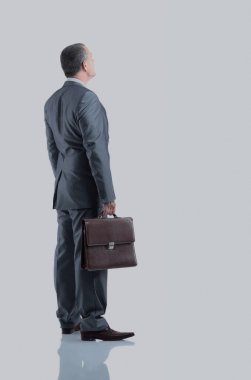 Gri takım elbise brown ile bir işadamı arka görünümü