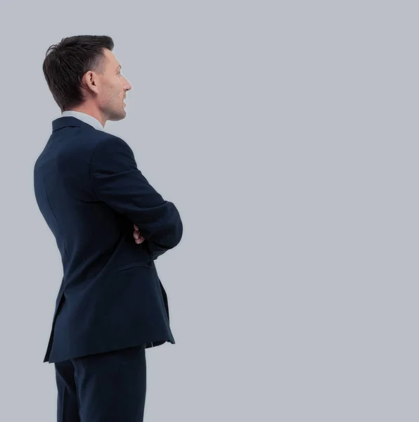 Vista lateral de un hombre de negocios sonriente, sobre fondo blanco —  Fotos de Stock