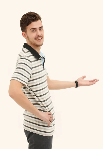 Joven apuntando a la pantalla en blanco . — Foto de Stock