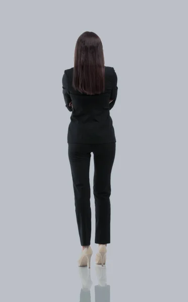 Business woman from the back - looking at something over a white — Stock Photo, Image