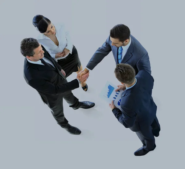 Blick von oben auf Geschäftsleute, die Hände schütteln und eine Besprechung beenden - Willkommen im Geschäft — Stockfoto