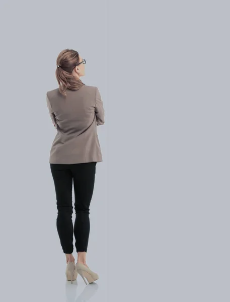 Full-length back side of businesswoman, isolated on white. — Stock Photo, Image