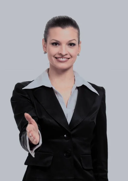 Happy podnikatelka v obleku dává ruku pro handshake. — Stock fotografie