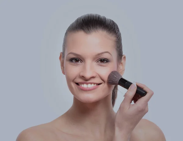 Jong meisje passen make-up — Stockfoto