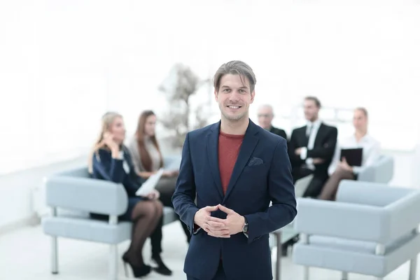 successful businessman on blurred background business team.