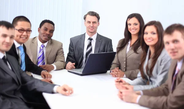 Business man and business team sitting at Desk — стоковое фото