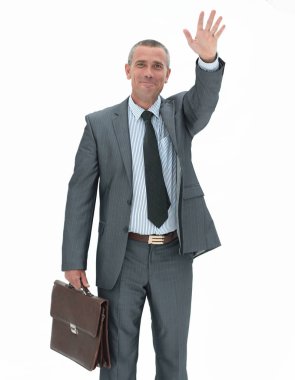 Kendine güvenen işadamı konuksever bir el hareketi yapma