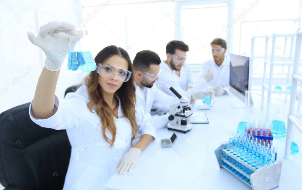 group of young scientists working in the laboratory.