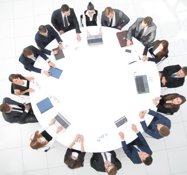 view from the top.meeting of shareholders of the company at the round - table. clipart