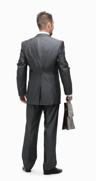 In full growth.rear view.businessman with a briefcase. — Stock Photo, Image