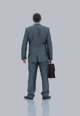 Gri takım elbise brown ile bir işadamı arka görünümü