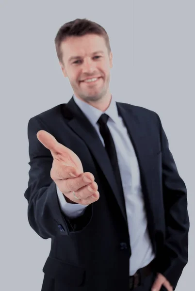Retrato de un exitoso hombre de negocios dando una mano en una b blanca —  Fotos de Stock