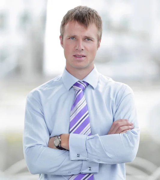 Portrait of a businessman with arms crossed — Stock Photo, Image