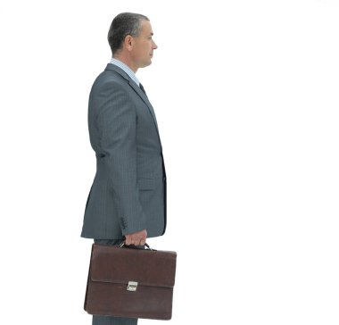 evrak çantası ile yan view.confident iş adamı.