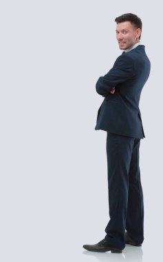 Beyaz arka plan üzerinde gülümseyen bir işadamı, yan görünüm