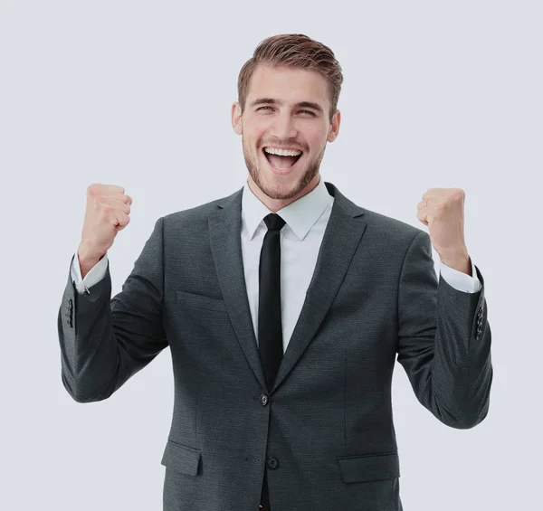 Businessman celebrating  with his fists raised in the air and a — Stock Photo, Image