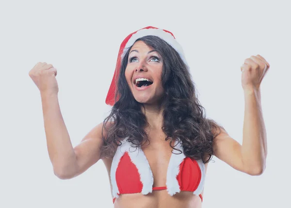 Mulher de Natal surpreso usando um chapéu de Papai Noel sorrindo isolado sobre um fundo branco — Fotografia de Stock