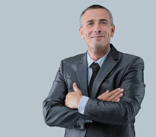 Portret van een vriendelijke zakenman in een grijs pak en t — Stockfoto