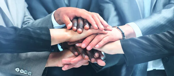 Closeup portrait of group of business people with hands together — Stock Photo, Image