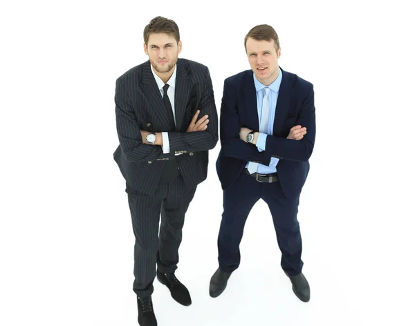 Em pleno crescimento. dois parceiros de negócios sérios em pé, isolado em fundo branco . — Fotografia de Stock