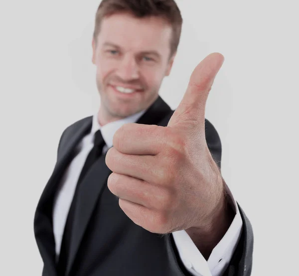 Aantrekkelijke man vertoont duimen omhoog teken met geluk. — Stockfoto